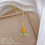 Gold Rose & Emerald Leaf Pendant