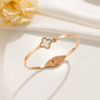 Wholesale Women'S Simple Titanium Steel Shell Acrylic Bracelet with Fourleaf Clover Pattern Inlaid with 18K Rose Gold